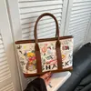 Bolsa Tote Graffiti Personalizada de Nicho para Mulheres, Novo Estilo Primavera 2026, Bolsa de Mão Color-Blocking, Bolsa de Compras de Grande Capacidade