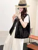 Chaleco de cuero sin mangas de alta gama a cuadros en bloques de color, cuello alto retro negro para mujer, chaqueta corta casual holgada de primavera 2026