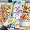 Pinza para el pelo de estrella de mar de color caramelo de celebridad de internet, flor de orquídea perla, pinza lateral para el pelo de niña con estilo dulce de vacaciones