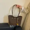 Bolsa de trabalho e para o dia a dia elegante, de grande capacidade, estilo coreano, para mulheres, novo modelo 2026, bolsa de ombro única, bolsa tote simples
