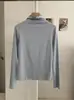 KEKEZOON Camiseta de manga larga ajustada de color liso con cuello semialto y volantes, hombro normal, prenda básica para mujer 8705