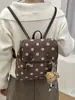 Mochila Escolar Transfronteiriça Outono 2026 para Mulheres, Versão Coreana, Moda Vintage Versátil Mochila de Bolinhas