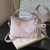 Nuevo bolso de mano cruzado para mujer con diseño único de lazo y lunares, bolso tipo almohada de moda con un toque de alta gama, de un solo hombro y cruzado
