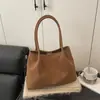 Bolsa de Ombro Versátil Cor Sólida Lacada com Design de Alto Padrão em Couro Japonês e Coreano 2025 para o Trabalho, Bolsa Tote Simples de Nicho