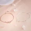 Ticky disparo real simple pulsera de plata de ley 925 doble flor de cerezo femenina pequeña fresca flor Mori viajero Joker