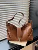 Ozon Rusia transfronterizo 2026 nuevo bolso de mano grande, estilo motociclista de cuero suave, bolso de hombro para el día a día, debajo del brazo