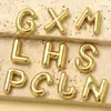 Europa y Estados Unidos venta caliente oro real 18k acero de titanio 26 letra colgante burbuja acero inoxidable joyería accesorios diy colgante de collar