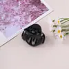 Pinza para el pelo hueca irregular de ámbar retro, pinza de calabaza negra simple y versátil, sujetador de coleta para persona perezosa, moño para el pelo, accesorios para el pelo