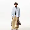 Camisa juvenil azul con bordado floral tridimensional para hombres y mujeres, camisa casual holgada de manga larga para pareja, estilo dopamina de otoño