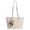 Nueva bolsa de mano transfronteriza, bolso de mujer de gran capacidad, bolso de hombro vintage de otoño e invierno, bolso de cadena de alta gama con patrón de diamantes para el trabajo
