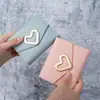 Bolsa para monedas versátil de dropshipping, monedero clutch tarjetero con forma de corazón personalizado de moda 2026, venta al por mayor transfronteriza
