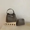 2026 Nova Bolsa de Balde Portátil de Grande Capacidade para Mulheres Padrão Lichia Bolsa para o Dia a Dia Bolsa de Ombro Cruzada Simples de Alta Qualidade