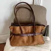 Bolso tote de lujo ligero de alta gama, nicho, para mujer, nuevo otoño 2026, vintage, versátil, de gran capacidad, bandolera