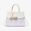 Bolsa de Mujer de Brocado Zhuang de Guangxi Patrimonio Cultural Inmaterial Bolsa Grande para Mamá Modelo Nuevo 2026 Estilo Único Bolso de Hombro Cruzado Bolso de Mano