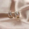Brincos Entrelaçados Uilz com Zircônia Completa Transfronteiriços, Design Coreano de Nicho, Brincos Femininos de Alta Qualidade, Versáteis e Elegantes