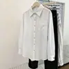 Ropa europea y americana nueva para mujer, transfronteriza, camisa versátil de manga larga con botones metálicos y bolsillos, adecuada para todas las estaciones