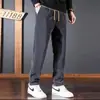 Calças Casuais Marca da Moda Cintura Apertada Solta Não Magnético Não Amassa Perna Reta Roupa de Trabalho Moda Masculina Calças de Veludo Cotelê Outono Inverno