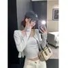 Camisola Listrada Colorida de Contraste de Nicho Conjunto Hot Girl Cardigã de Manga Longa com Temperamento Feminino Jaqueta Curta Conjunto de Duas Peças