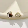 Pendientes cuadrados irregulares de textura vintage con piedra ojo de tigre, pendientes de nicho de alta gama, versátiles para el uso diario y para ir al trabajo