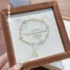 Pulsera de Plata Pura 9999 Esmaltada Pintada en Oro Trébol de Cuatro Hojas Plata de Ley China Esmaltada Pintada en Oro Exquisita Versátil Moderna Regalo para el Día de San Valentín Chino
