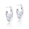 Pendientes de Gancho Curvo Plegados Huecos Estilo Ins Europeo y Americano Transfronterizos, Chapados en Cobre con Oro Real, Pendientes de Moda con un Toque de Lujo Ligero y de Alta Gama