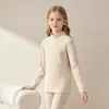 Conjunto de ropa interior térmica para niños, que incluye capas base térmicas de seda y lana, camisetas interiores de cuello alto y pantalones térmicos engrosados, tanto para niños como para niñas.