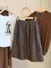 Falda Retro de Cuero PU con Lunares para Mujer, Nueva Moda Otoño Cintura Alta Holgada Versátil Adelgazante Línea A Midi