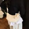 2026 Versión Coreana Nuevo Estilo Piel Suave de PU Color Sólido Bolso Croissant Nicho de Moda Tendencia Personalizada Hombro Único Cruzado Bolso Dumpling