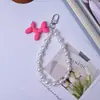 Capa de Celular Cachorro Bolha Corrente para Pendurar Chaveiro de Miçangas DIY Pingente Corrente de Mão Anti-Perda Acessórios Versáteis Nicho Feminino