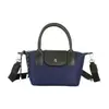 Bolsa de ombro única de nylon color-blocking transfronteiriça bolsa de bolinho outono versátil pequena nicho bolsa de mão textura moderna bolsa de ombro única