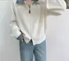 Suéter de moda estilo europeu e americano com lapela jeans e zíper duplo para mulheres, novo cardigã de tricô solto casual com blocos de cor para outono e inverno