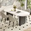 Mesa de comedor de color crema, moderna y lujosa con tapa de piedra para uso doméstico, con un diseño moderno y minimalista de forma ovalada negra, adecuada para comedores