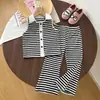 Ropa para Niñas de Venta Caliente Transfronteriza Nueva Moda Chaleco de Punto con Solapa Rayado Cárdigan + Pantalones Acampanados Conjunto para Niñas
