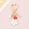 Llavero Cadena Perla Sakura Colgante Corazón Girly Dulce Hecho a Mano DIY Encanto para Bolso Llavero