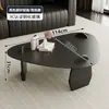 Mesa de centro minimalista de vidrio templado con diseño de ondas de agua, adecuada para apartamentos pequeños, ofreciendo un aspecto moderno y elegante para la sala de estar