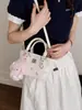 Bolso Cubo Estilo Japonés y Coreano con Estampado de Dibujos Animados para Mujer 2026 Nueva Moda Bolso de Hombro Cruzado Versátil para Viajes Casuales