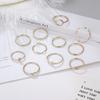 Anillo de venta caliente transfronterizo moda europea y americana anillo simple liso corrugado palabra O combinación de anillos 11 piezas salida de fábrica