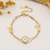 Pulseira de Aço Inoxidável Trevo de Quatro Folhas Mais Vendida Transfronteiriça Luxo Leve Versão Coreana Ouro Real 18K Joia de Mão Simples Nicho Popular Atacado