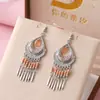 Joyería Daisy 12 Colores Piezas Metálicas Pequeñas en Forma de Abanico Pendientes Vintage Estilo Étnico Pendientes Largos Multicapa Joyería de Yunnan