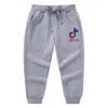 Calça Longa Infantil Estilo Coreano Primavera e Outono 2022 Roupa de Bebê Casual Esportiva Algodão Calças Unissex