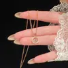 Anillo de botella de perfume color oro rosa, collar brillante de circonita, cadena para clavícula de lujo de alta gama, nicho exquisito para mujer
