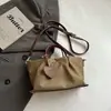 Shuai Mijia 2026 Verão Nova Simples Personalidade Estilosa Cor Sólida Grande Capacidade Bolsa de Axila Moda Casual Bolsa de Ombro Único