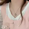 Colar com Pingente Bordado de Miçangas Semente Mocha em Cacho de Flores Novo Estilo, Elegante e Super Brilhante Corrente Clavícula de Zircônia e Pérola