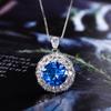 Zhuangshang-joyería de cobre chapada en oro para mujer, simulación de cristal azul afilado, temperamento redondo, traje de lujo, 12-7 mm, novedad de 2024
