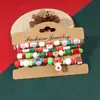 Adornos de Navidad Arcilla Blanda Pulsera de Navidad de Cristal Juego de 12 Pulseras Apiladas Pulsera de Letras Inglesas Papá Noel