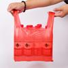 Bolsa de plástico gruesa con cara sonriente roja, venta al por mayor, conveniente para llevar comida, bolsa de compras, bolso de mano tipo chaleco.