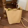 Bolsa de palha trançada simples de alta qualidade, design de nicho transfronteiriço para mulheres, novo modelo 2026, bolsa de ombro e transversal