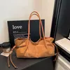 Bolso de Hombro de Gamuza Plegado con Cordón Estilo Coreano de Nicho para Mujer Otoño/Invierno 2026 Nuevo Casual Ligero