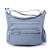 Bolso nuevo para mujer 2023 gran capacidad exterior ocio hombro simple nailon multibolsillo bolso para madre bolso cruzado para mujer