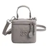 Bolsos pequeños populares de verano para mujer 2026 nuevo bolso versátil de cadena cruzado bolso de mano de moda bolso cuadrado pequeño tipo caja